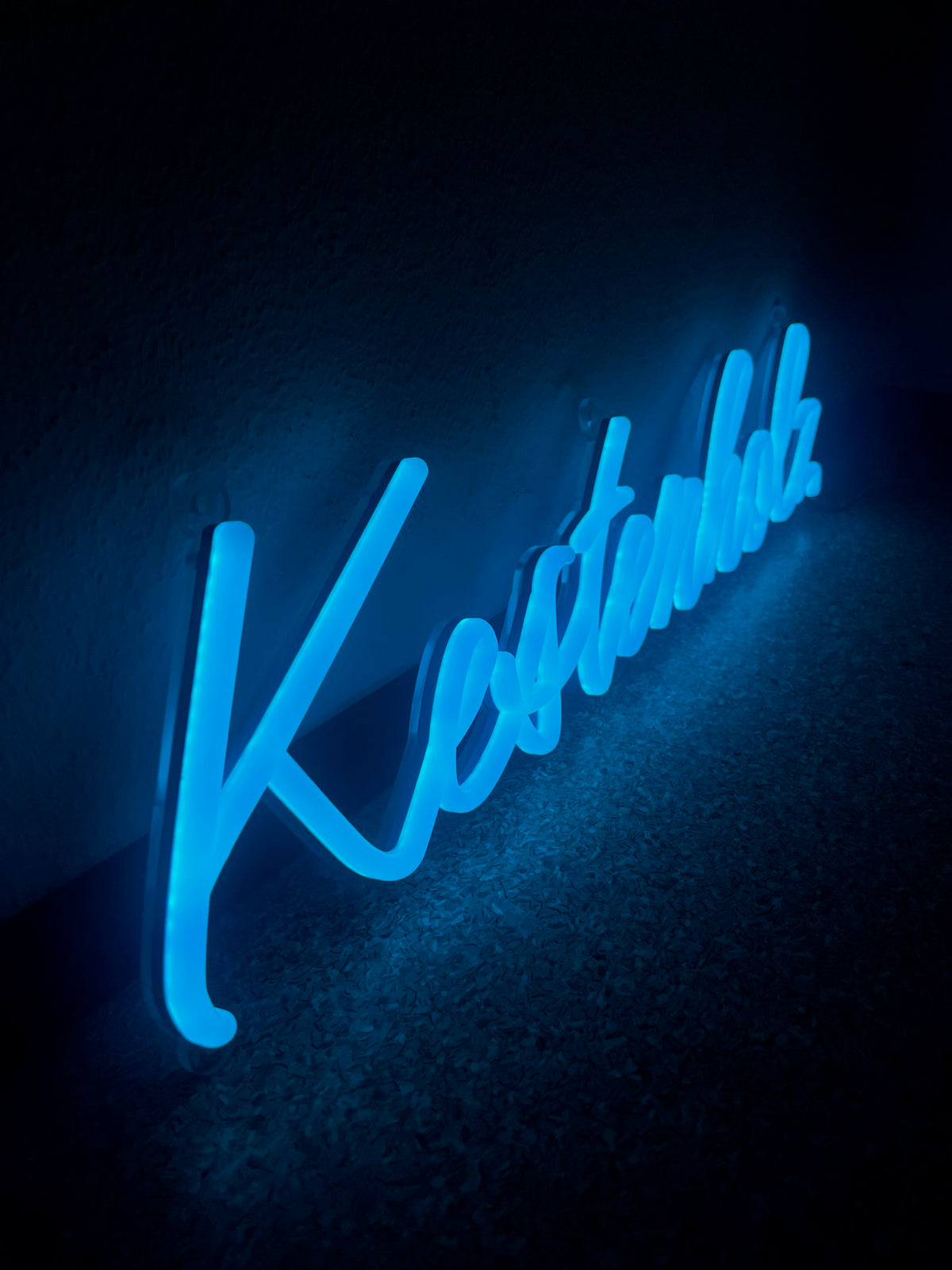 Acrylic neon sign waterproof logo on a dark background