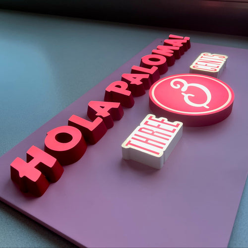 illuminated sign channel letters on metal backplate for restaurant