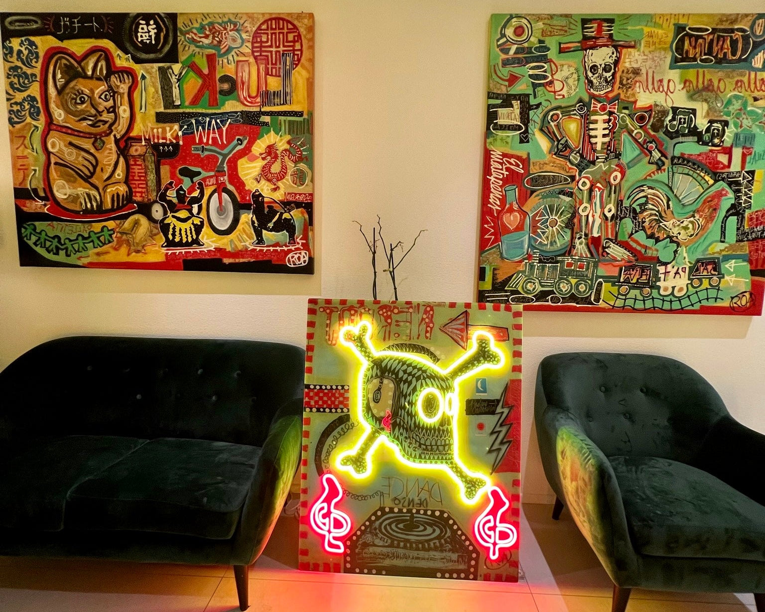 Colorful mexican art and a neon sign 